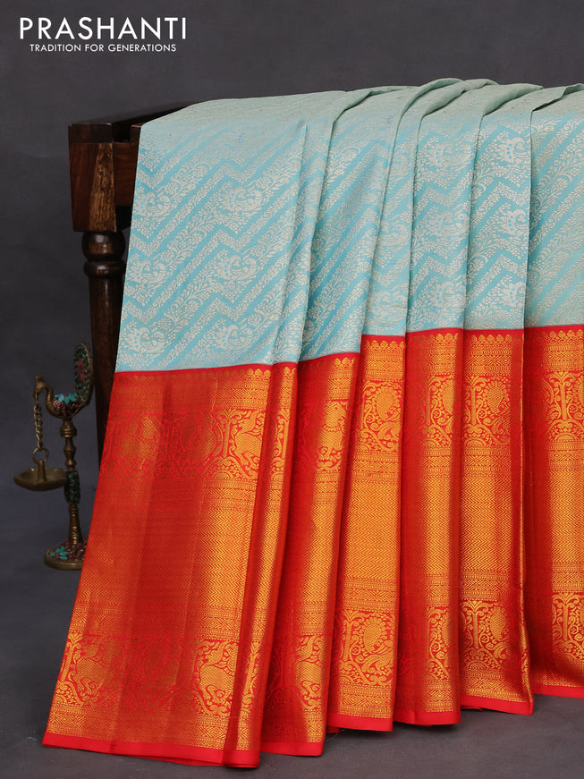 Pure kanchipuram silk saree light blue and red with allover silver zari woven brocade weaves and long zari woven annam border