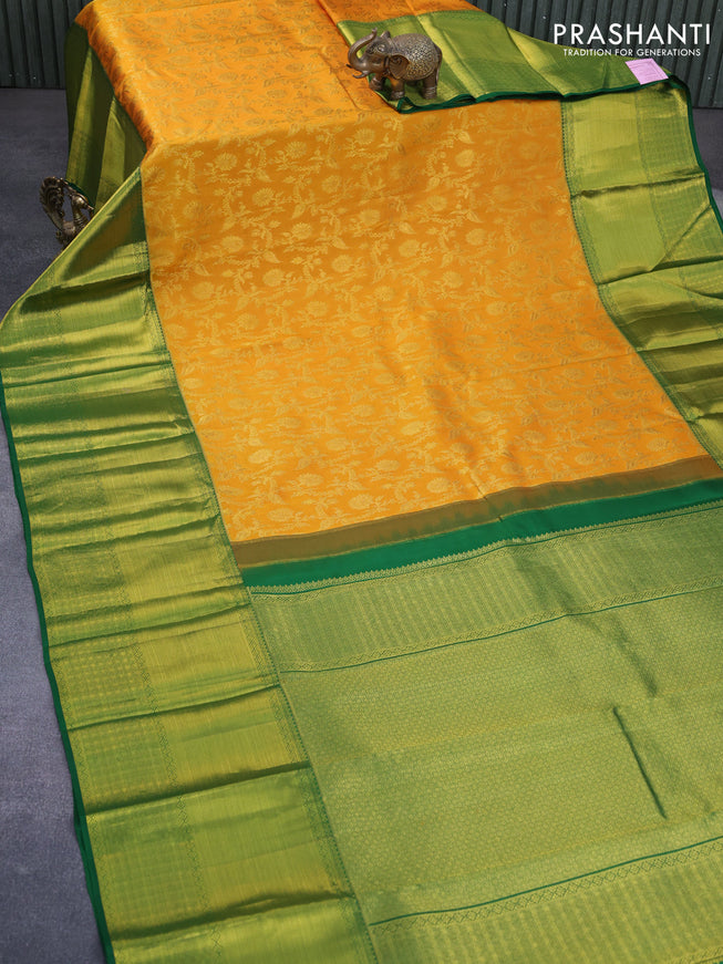 Pure kanchipuram silk saree mustard shade and green with allover zari woven brocade weaves and long zari woven border