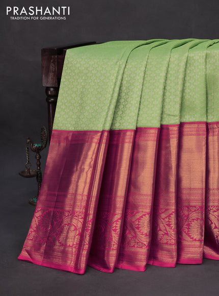 Pure kanchipuram silk saree pastel green and pink with allover silver zari woven brocade weaves and long zari woven floral border