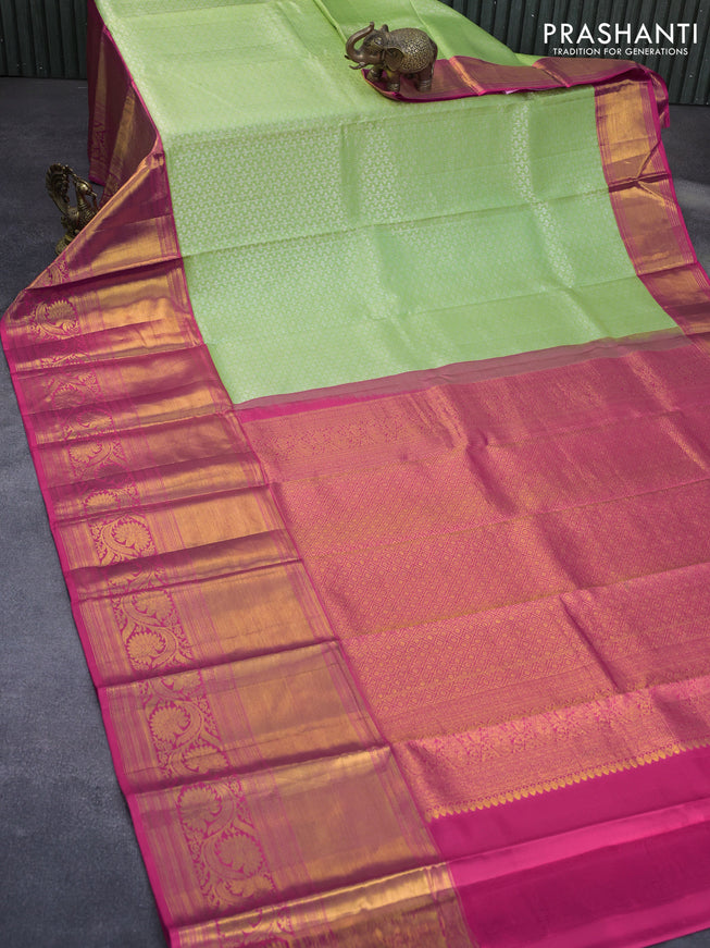 Pure kanchipuram silk saree pastel green and pink with allover silver zari woven brocade weaves and long zari woven floral border