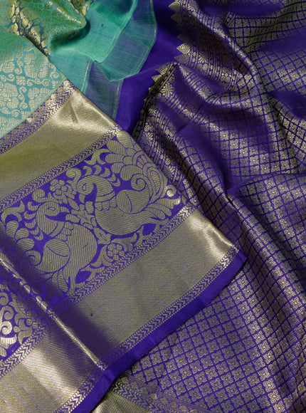 Pure kanchipuram silk saree pastel green and blue with allover zari woven brocade weaves and long annam zari woven border