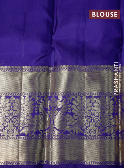 Pure kanchipuram silk saree pastel green and blue with allover zari woven brocade weaves and long annam zari woven border