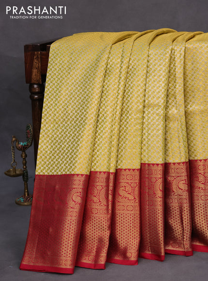 Pure kanchipuram silk saree gold and maroon with allover zari woven brocade weaves and long zari woven border