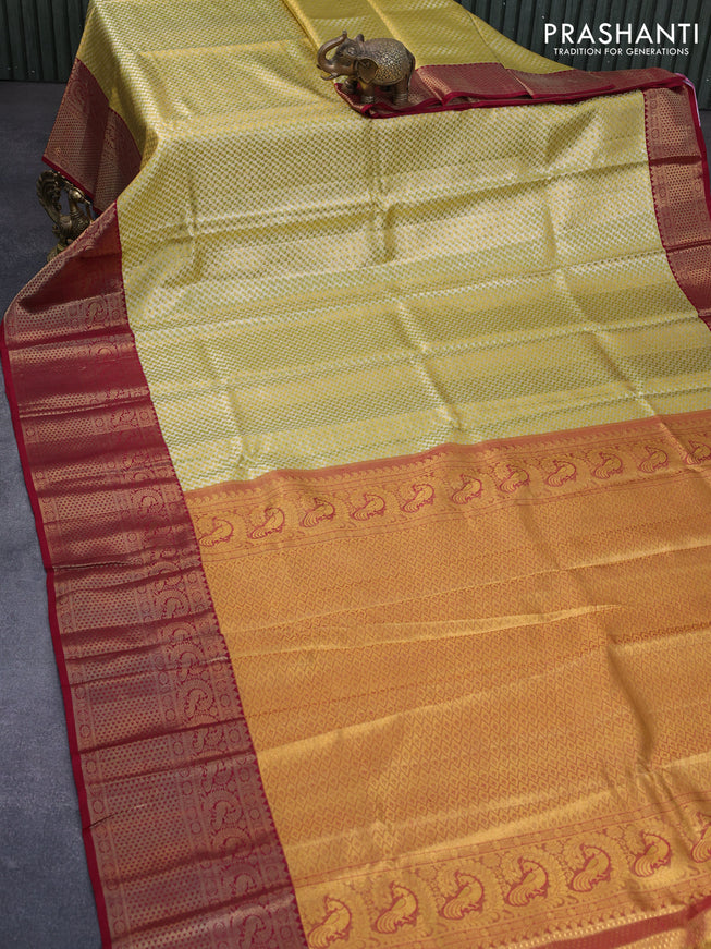 Pure kanchipuram silk saree gold and maroon with allover zari woven brocade weaves and long zari woven border