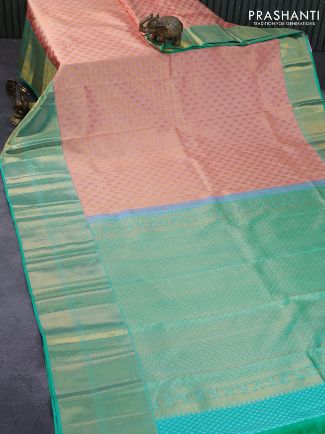 Pure kanchipuram silk saree peach pink and teal blue with allover zari woven paisley butta weaves and long zari woven border