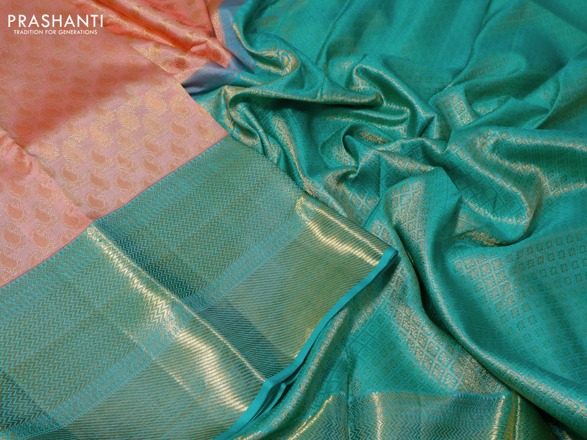 Pure kanchipuram silk saree peach pink and teal blue with allover zari woven paisley butta weaves and long zari woven border