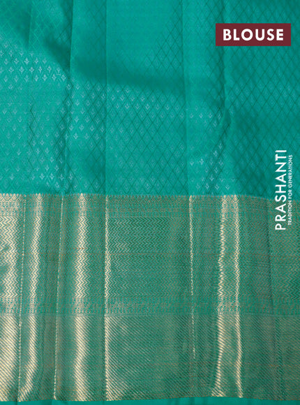 Pure kanchipuram silk saree peach pink and teal blue with allover zari woven paisley butta weaves and long zari woven border