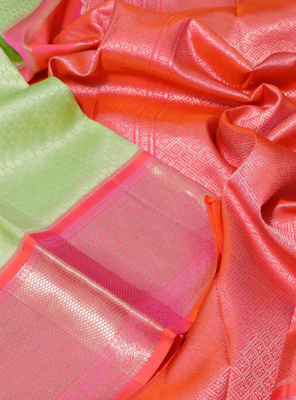 Pure kanchipuram silk saree pista green and dual shade of pinkish orange with allover zari woven brocade weaves and long zari woven peacock design border