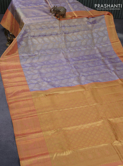 Pure kanchipuram tissue silk saree grey shade and peach shade with allover zari woven brocade weaves and long zari woven peacock design border