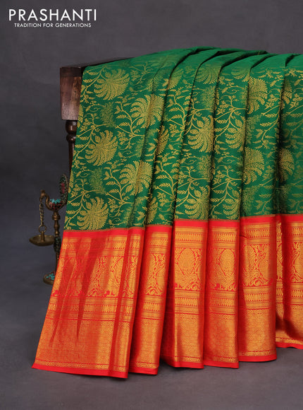 Pure kanchipuram silk saree green and orange with allover zari woven brocade weaves and long zari woven border