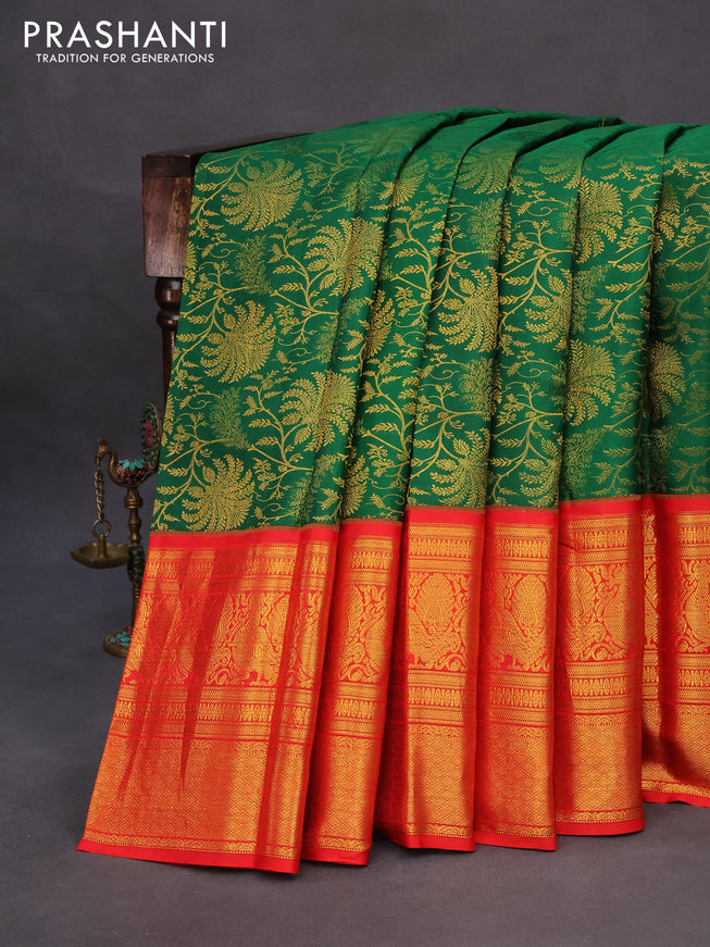 Pure kanchipuram silk saree green and orange with allover zari woven brocade weaves and long zari woven border