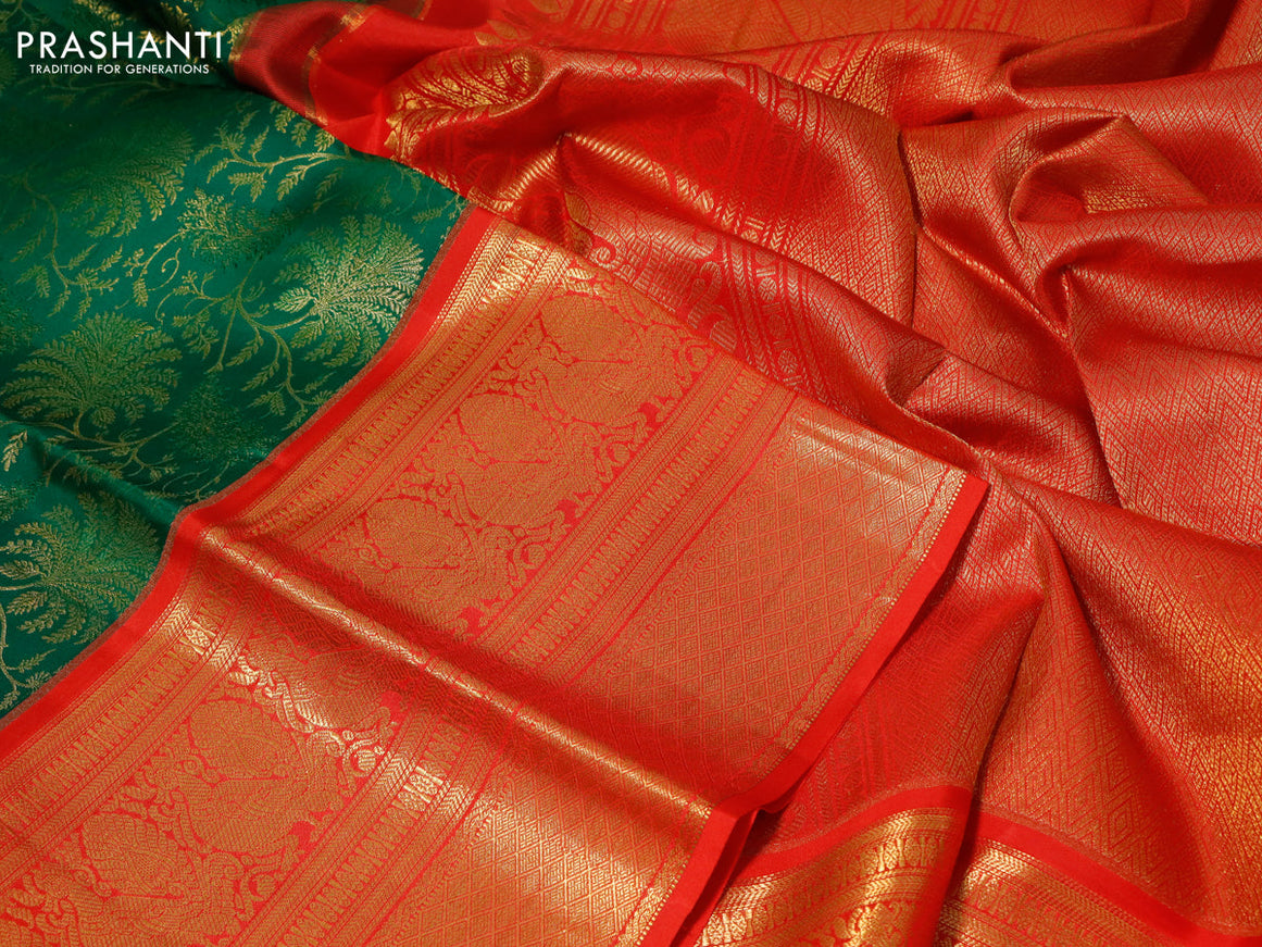 Pure kanchipuram silk saree green and orange with allover zari woven brocade weaves and long zari woven border