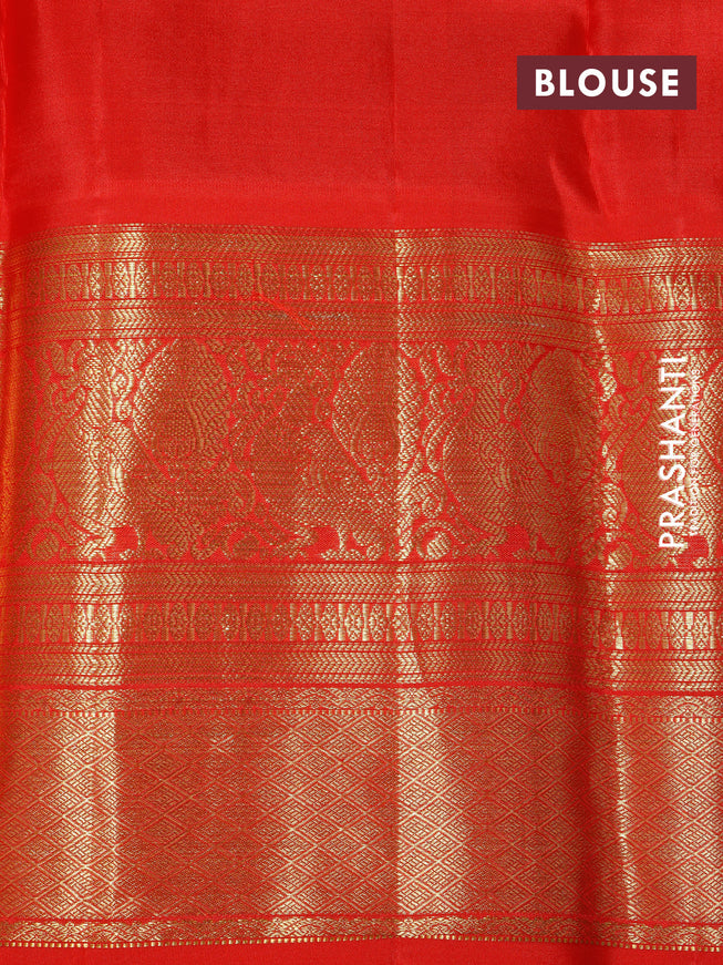 Pure kanchipuram silk saree green and orange with allover zari woven brocade weaves and long zari woven border