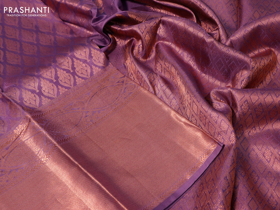 Pure kanchipuram silk saree mild lavender shade with allover copper zari woven butta weaves and long copper zari woven border