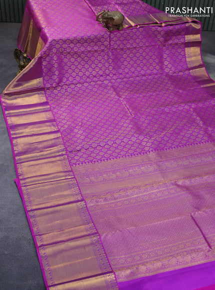 Pure kanchipuram silk saree purple with allover zari woven butta weaves and long zari woven border