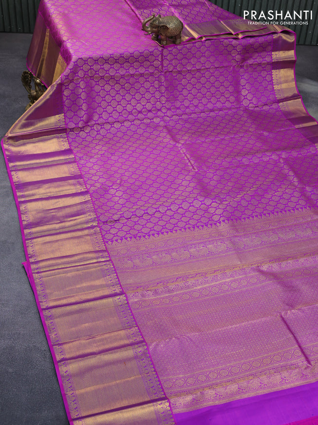 Pure kanchipuram silk saree purple with allover zari woven butta weaves and long zari woven border