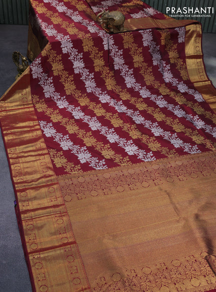 Pure kanchipuram silk saree maroon with allover silver & gold floral weaves and long zari woven border