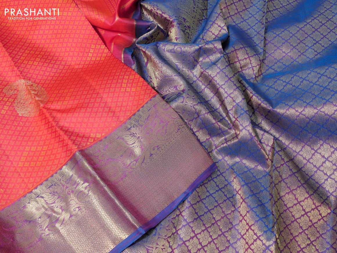 Pure kanchipuram silk saree dual shade of pinkish orange and cs blue with allover self emboss & zari buttas and zari woven border