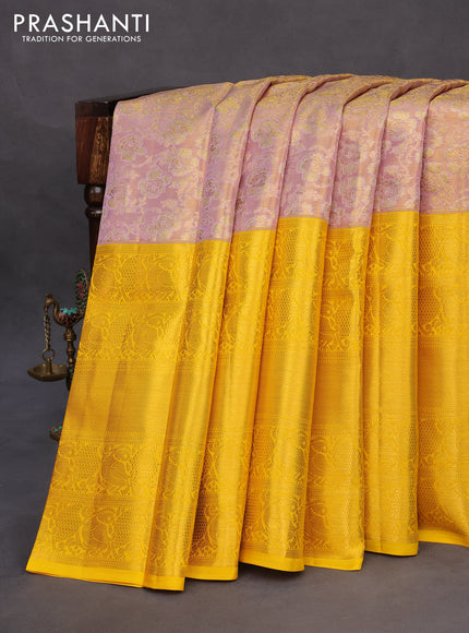 Pure kanchipuram tissue silk saree dual shade of lavender and yellow with allover zari woven brocade weaves and long zari woven border