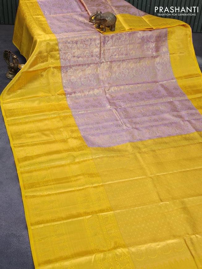 Pure kanchipuram tissue silk saree dual shade of lavender and yellow with allover zari woven brocade weaves and long zari woven border