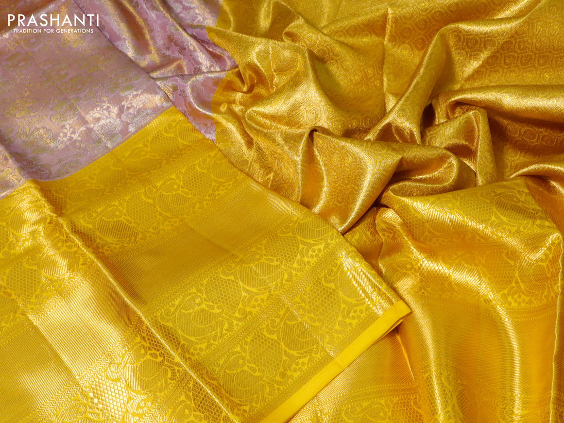 Pure kanchipuram tissue silk saree dual shade of lavender and yellow with allover zari woven brocade weaves and long zari woven border