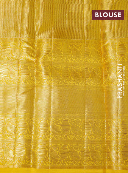 Pure kanchipuram tissue silk saree dual shade of lavender and yellow with allover zari woven brocade weaves and long zari woven border