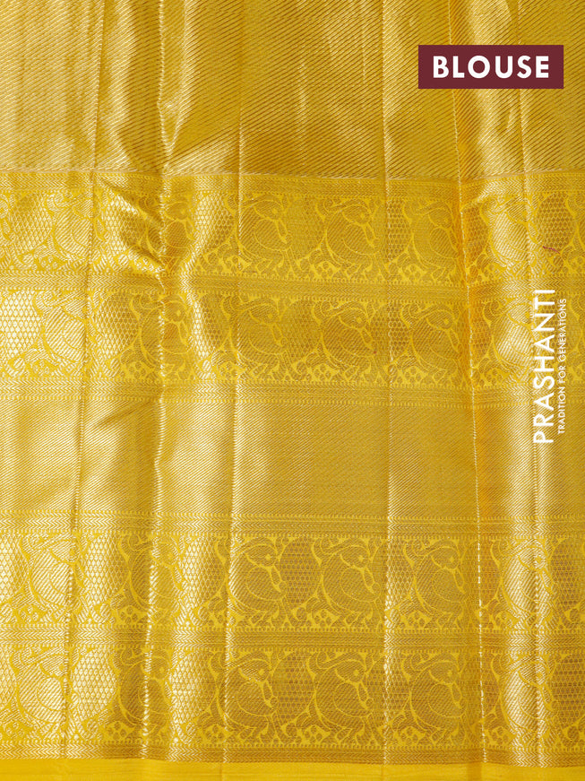 Pure kanchipuram tissue silk saree dual shade of lavender and yellow with allover zari woven brocade weaves and long zari woven border