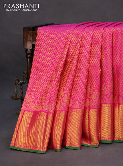 Pure kanchipuram silk saree pink and green with allover zari woven butta weaves and zari woven border