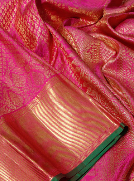 Pure kanchipuram silk saree pink and green with allover zari woven butta weaves and zari woven border