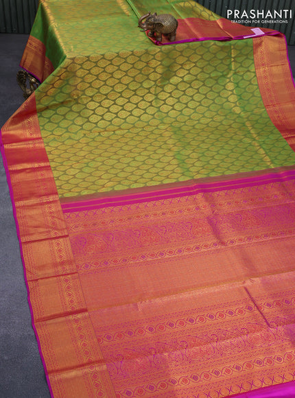 Pure kanchipuram silk saree dual shade of green and pink with allover zari woven butta weaves and zari woven border