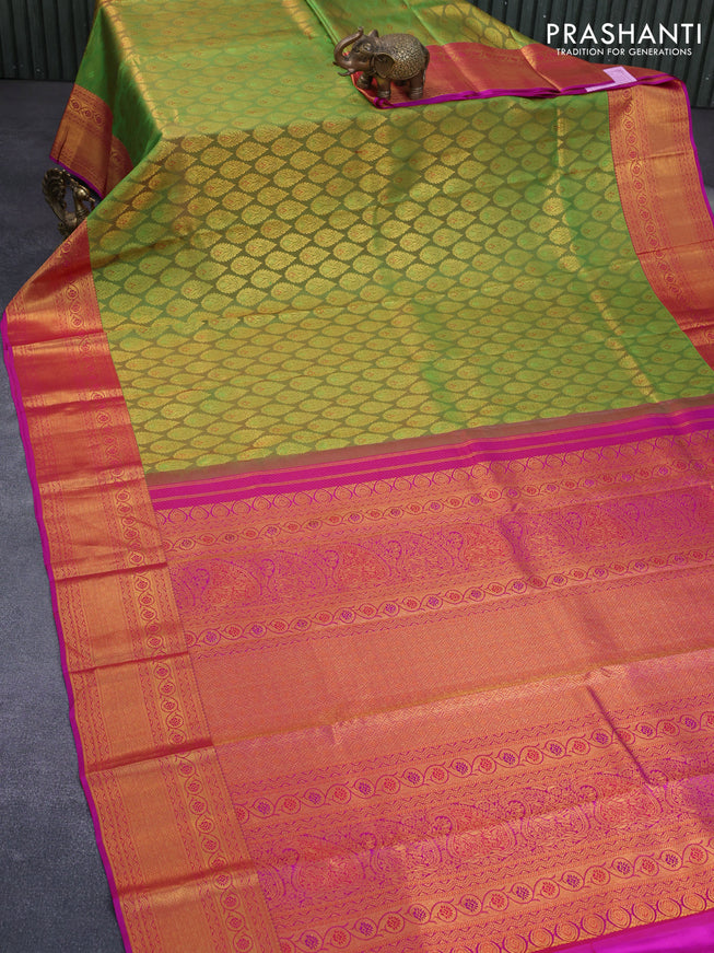 Pure kanchipuram silk saree dual shade of green and pink with allover zari woven butta weaves and zari woven border