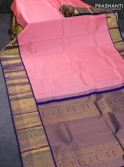 Pure kanchipuram silk saree light pink and blue with allover zari butta weaves and long zari woven border