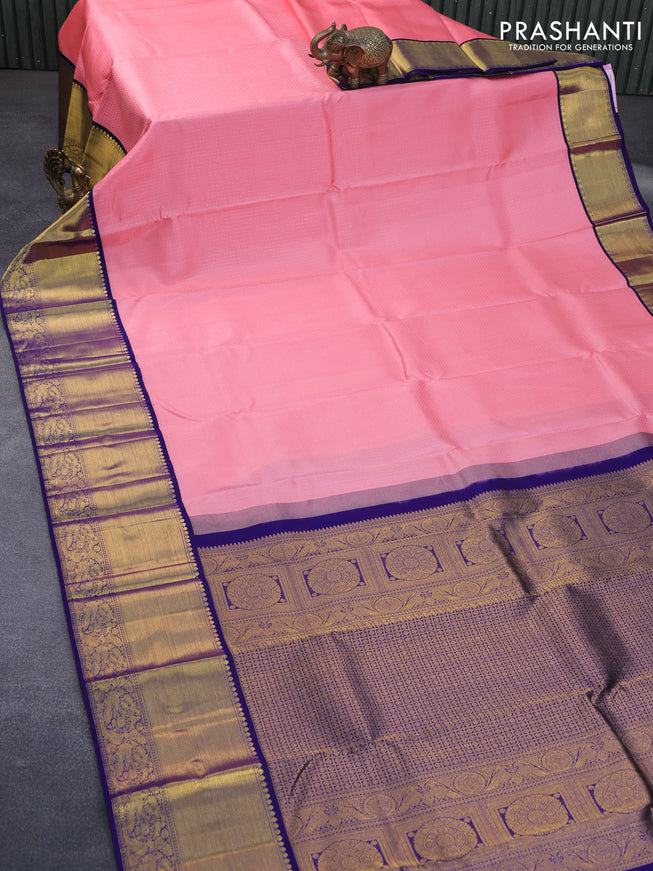 Pure kanchipuram silk saree light pink and blue with allover zari butta weaves and long zari woven border