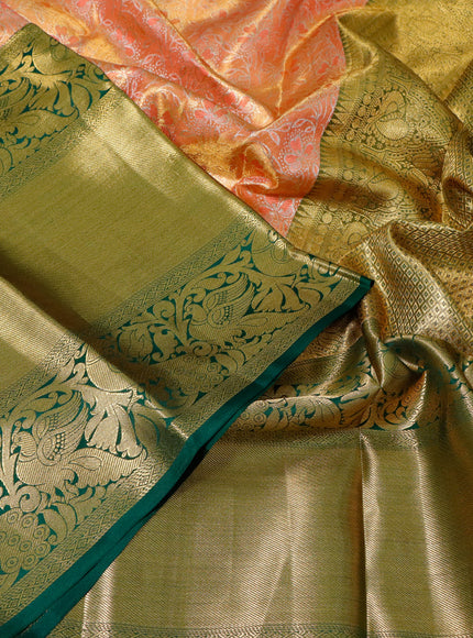 Pure kanchipuram tissue silk saree peach orange and green with allover zari woven brocade weaves and long zari woven border