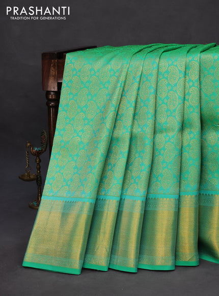 Pure kanchipuram silk saree teal green with allover zari woven paisley weaves and zari woven border