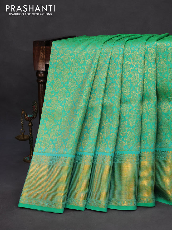 Pure kanchipuram silk saree teal green with allover zari woven paisley weaves and zari woven border