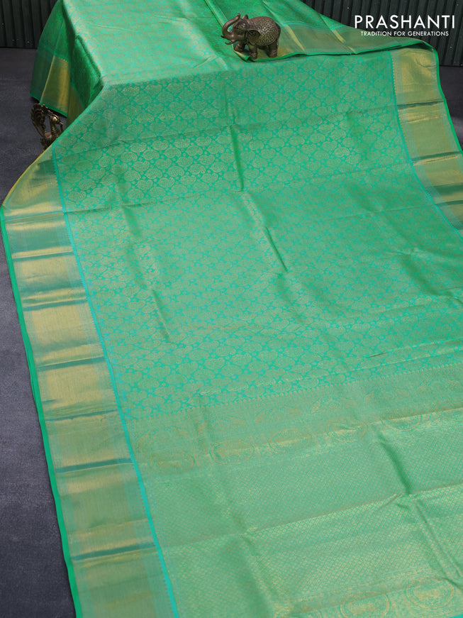 Pure kanchipuram silk saree teal green with allover zari woven paisley weaves and zari woven border