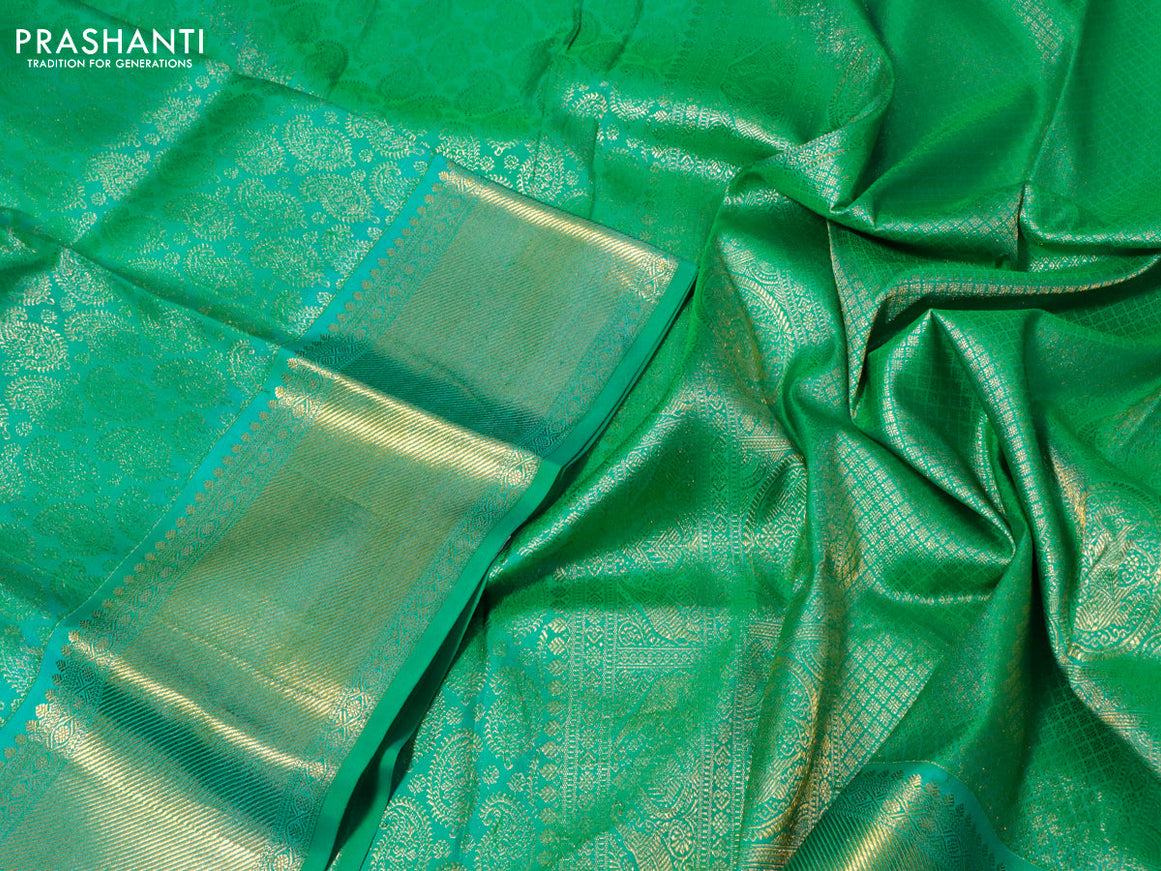 Pure kanchipuram silk saree teal green with allover zari woven paisley weaves and zari woven border