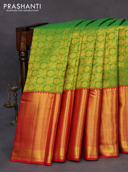 Pure kanchipuram silk saree green and red with allover zari checks & buttas and long zari woven border