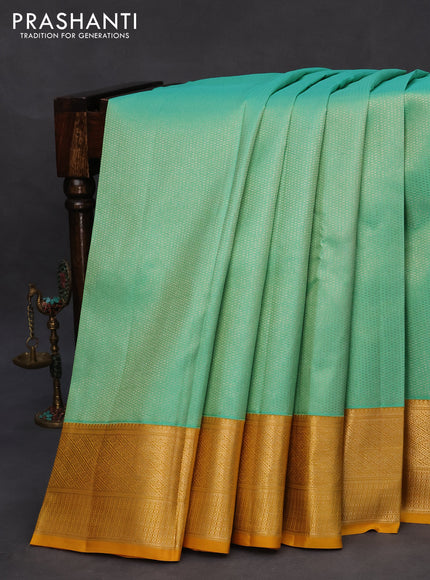 Pure kanchipuram silk saree teal green and yellow with allover silver zari woven brocade weaves and zari woven border