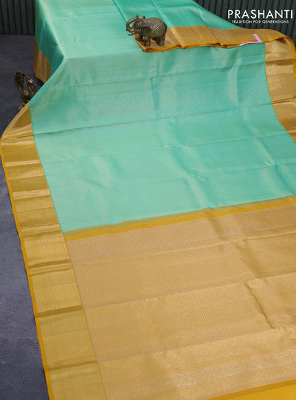 Pure kanchipuram silk saree teal green and yellow with allover silver zari woven brocade weaves and zari woven border