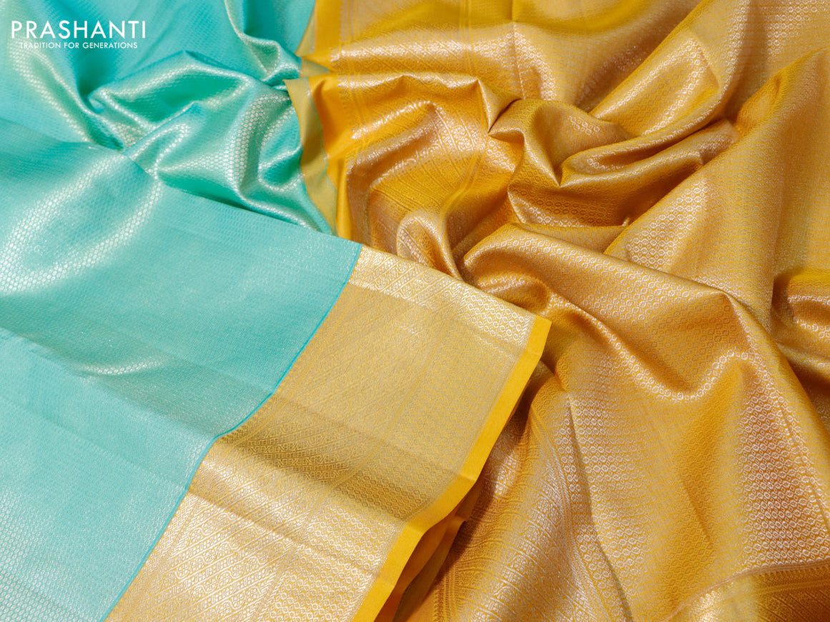 Pure kanchipuram silk saree teal green and yellow with allover silver zari woven brocade weaves and zari woven border