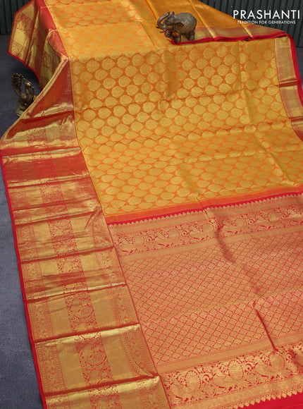 Pure kanchipuram silk saree mustard yellow and red with zari woven buttas and long zari woven border