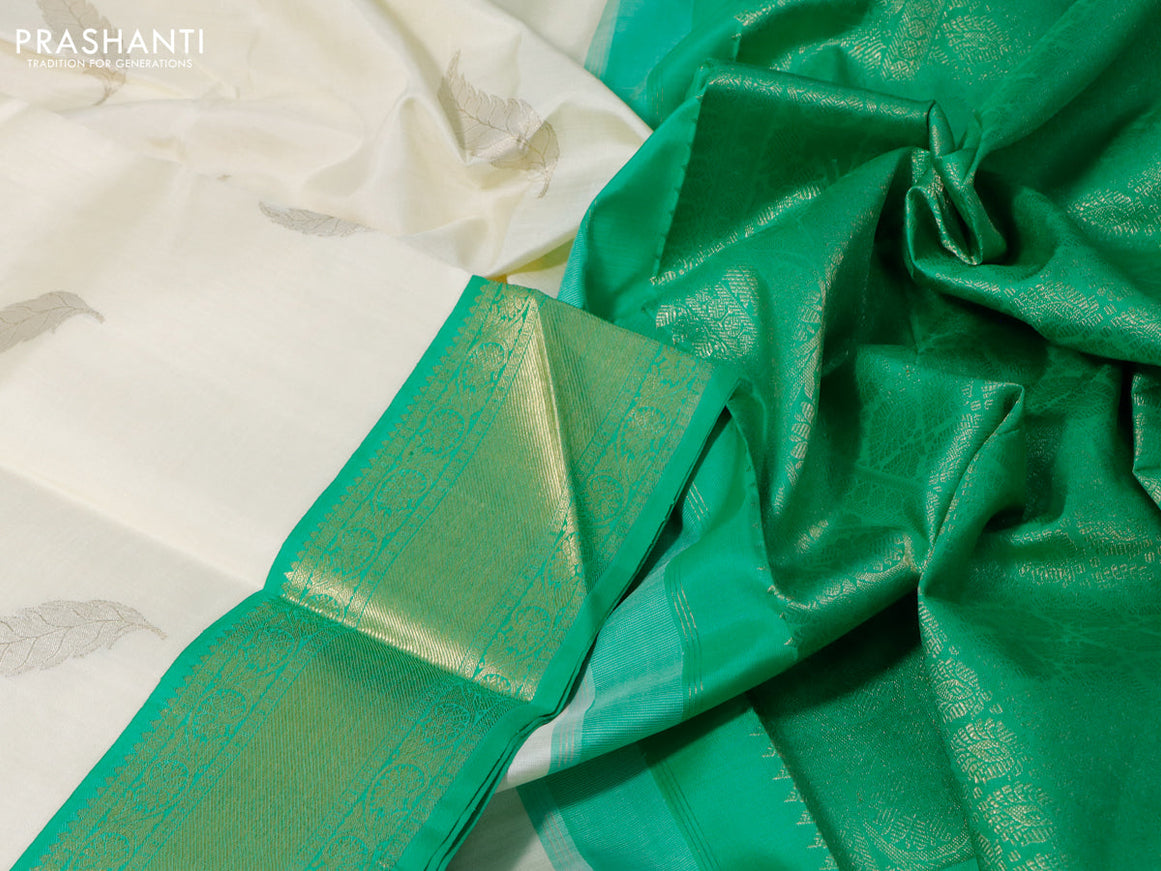 Pure kanchipuram silk saree off white and green with zari woven leaf buttas and zari woven border