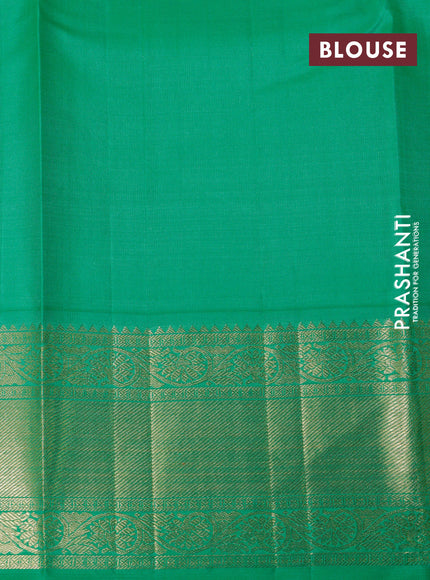 Pure kanchipuram silk saree off white and green with zari woven leaf buttas and zari woven border