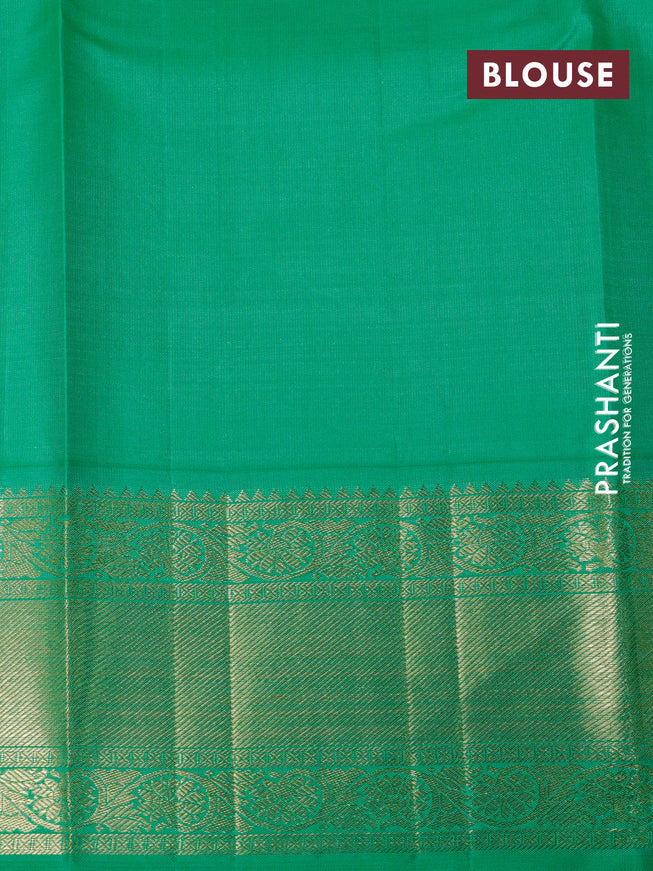 Pure kanchipuram silk saree off white and green with zari woven leaf buttas and zari woven border