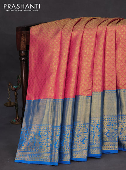 Pure kanchipuram tissue silk saree dual shade of pinkish gold and cs blue with allover zari woven brocade weaves and long zari woven border