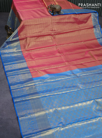 Pure kanchipuram tissue silk saree dual shade of pinkish gold and cs blue with allover zari woven brocade weaves and long zari woven border