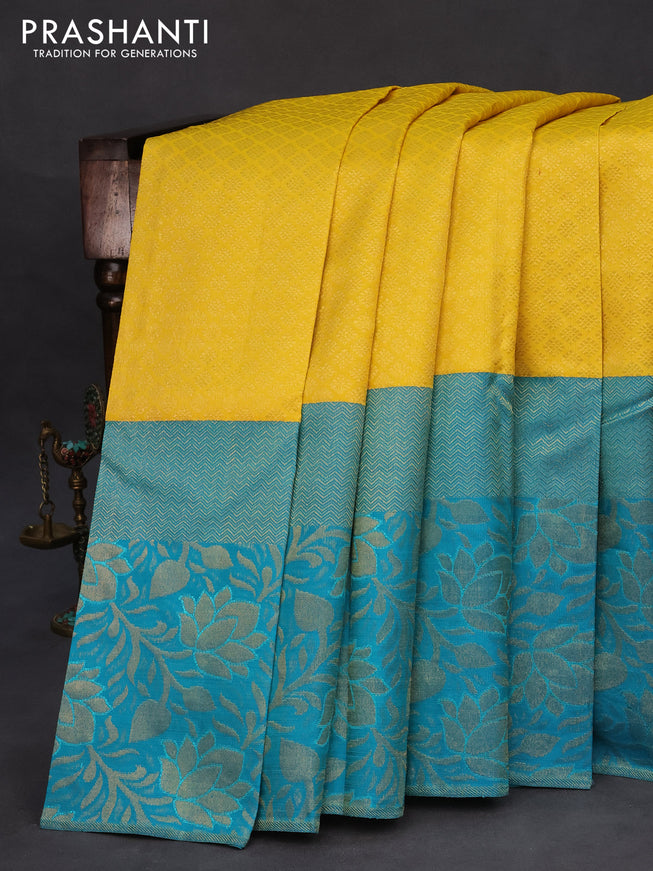 Pure kanchipuram silk saree yellow and teal blue with allover zari woven brocade weaves and long zari woven border