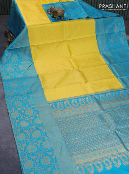 Pure kanchipuram silk saree yellow and teal blue with allover zari woven brocade weaves and long zari woven border